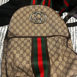 Pre-Owned Gucci Backpack - Classic Style, Great Condition (Minor Repair Needed)